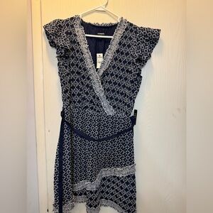 Navy blue knee length dress with white eyelet detailing. Size L